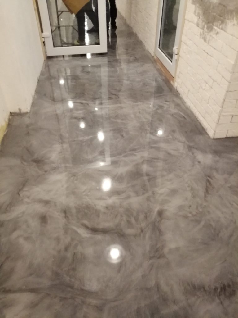Clear epoxy on smoothen concrete surfaces create a slippery floor? TKI COATING Epoxy floor